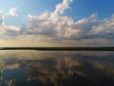Nature drone sea view with clouds reflections on Arabatskaya Strelka , Ukraine