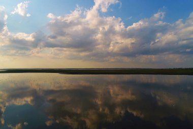 Nature drone sea view with clouds reflections on Arabatskaya Strelka , Ukraine
