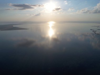 Nature drone sea view with clouds reflections on Arabatskaya Strelka , Ukraine