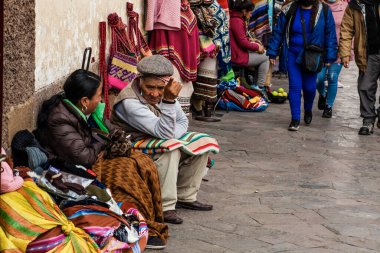 PERU - MAY 15, 2022: Peruvian people in traditional clothes in Cuzco.  Cusco, Peru, May 15, 2022