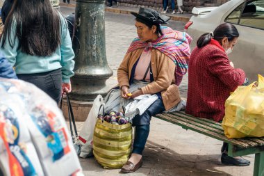 PERU - MAY 15, 2022: Peruvian people in traditional clothes in Cuzco.  Cusco, Peru, May 15, 2022