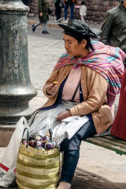 PERU - MAY 15, 2022: Peruvian people in traditional clothes in Cuzco.  Cusco, Peru, May 15, 2022