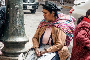 PERU - MAY 15, 2022: Peruvian people in traditional clothes in Cuzco.  Cusco, Peru, May 15, 2022