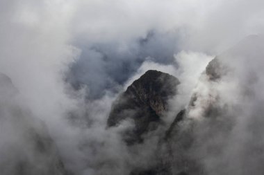 Morning mountains Andes in fog and clouds around Machu Picchu, Peru