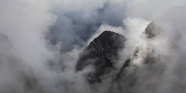 Morning mountains Andes in fog and clouds around Machu Picchu, Peru