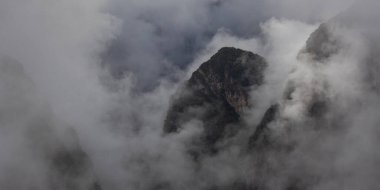 Morning mountains Andes in fog and clouds around Machu Picchu, Peru