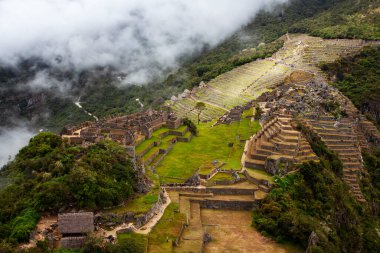 Machu Picchu ancient city view from Huchu'y Picchu in cloudy weather