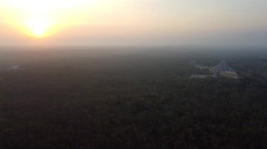 Chichen Itza pyramids and forest early morning in sunrise time