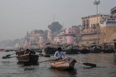 VARANASI, INDIA - November 15: Boats at the river ganges on the auspicious Maha Shivaratri festival on November 15, 2013 at Dasashwamedh ghat in Varanasi, Uttar Pradesh, India 