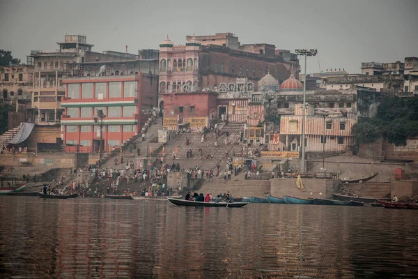 VARANASI, INDIA - DECEMBER 20: Hindus perform ritual puja at dawn in the Ganges River on December 20, 2007 in Varanasi, India