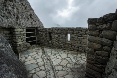 Machu Picchu ancient city view from Huchu'y Picchu in cloudy weather
