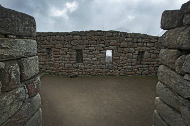 Machu Picchu ancient city view from Huchu'y Picchu in cloudy weather