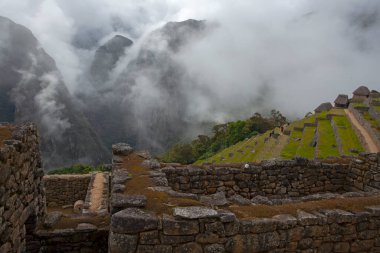 Machu Picchu ancient city view from Huchu'y Picchu in cloudy weather