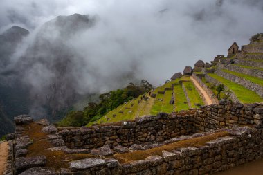 Machu Picchu ancient city view from Huchu'y Picchu in cloudy weather