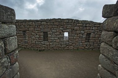 Machu Picchu ancient city view from Huchu'y Picchu in cloudy weather