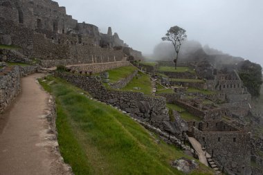 Machu Picchu ancient city view from Huchu'y Picchu in cloudy weather
