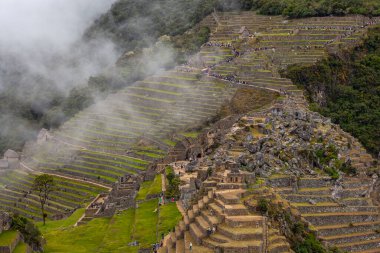 Machu Picchu ancient city view from Huchu'y Picchu in cloudy weather