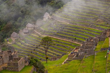Machu Picchu ancient city view from Huchu'y Picchu in cloudy weather