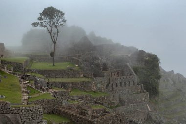 Machu Picchu ancient city view from Huchu'y Picchu in cloudy weather