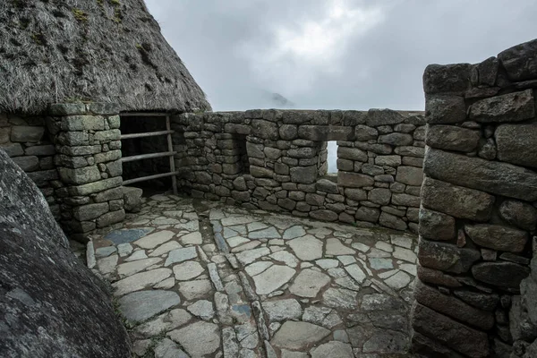 Machu Picchu ancient city view from Huchu'y Picchu in cloudy weather