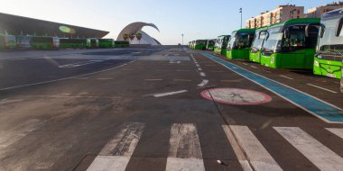 TENERIFE, SPAIN - February 16, 2022: Main bus station of the green buses operated by Titsa, located near the port of Santa Cruz de Tenerife clipart