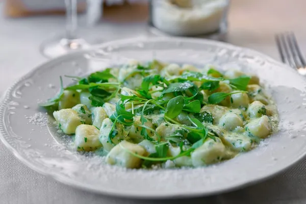 Gnocchi and cheese sauce — Stock Photo, Image