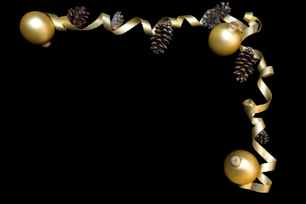 Gold ornaments and gold ribbon — Stock Photo, Image