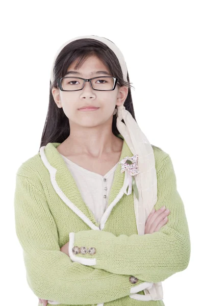 Confident, unsmiling girl in green sweater and glasses — Stock Photo, Image