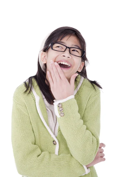 Girl in green sweater and glasses looking up and covering a laug — Stock Photo, Image