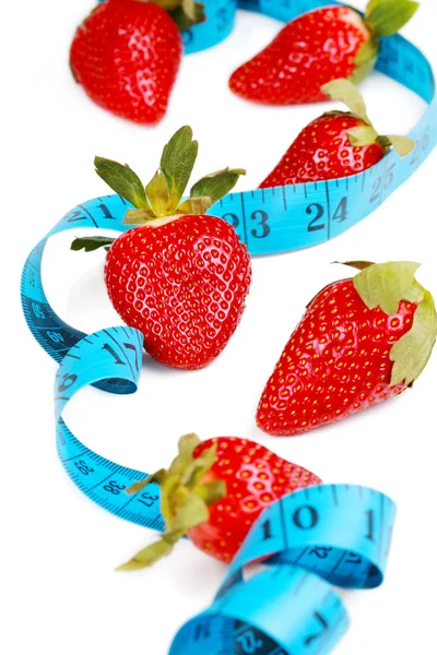 Berries with tape measure. Health concept. — Stock Photo, Image