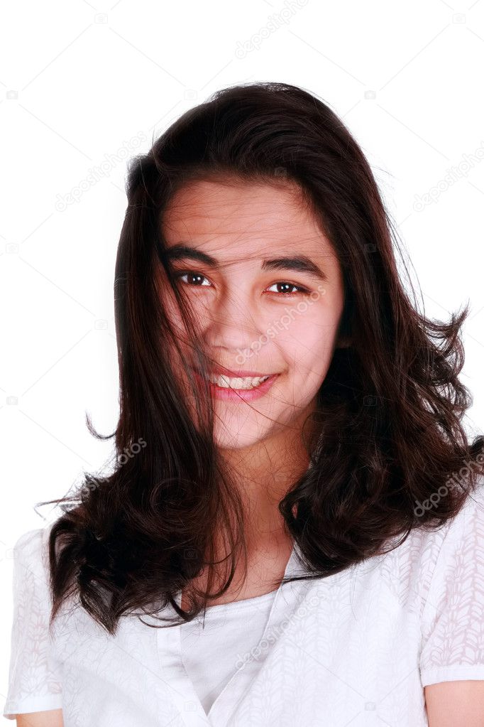 Beautiful biracial teen girl smiling, isolated