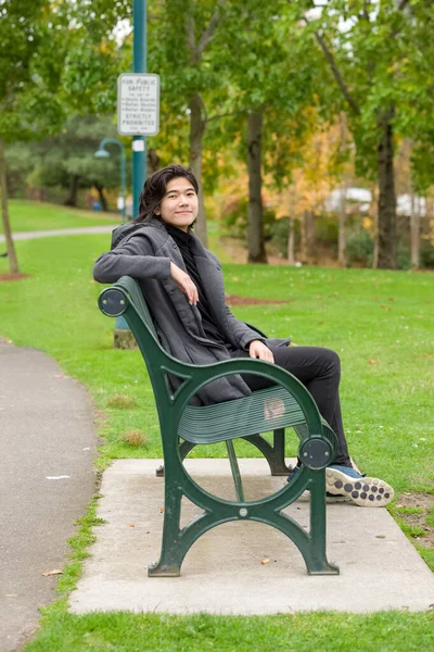 Smiling Biracial Teen Girl Young Adult Female Gray Jacket Sitting — Stock Photo, Image