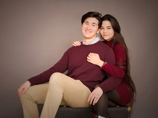 Attractive Young Biracial Couple Burgundy Colored Sweaters Posing Portrait — Fotografia de Stock