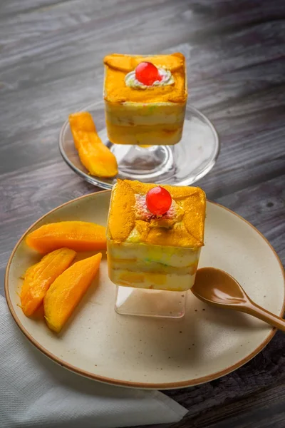 Mango mousse on a plate with copy space