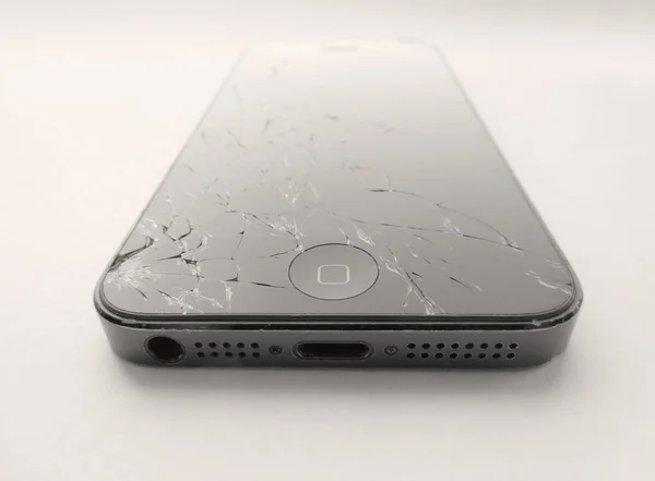 Broken Apple mobile device. — Stock Photo, Image