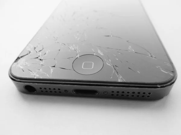 Broken Apple mobile device. — Stock Photo, Image