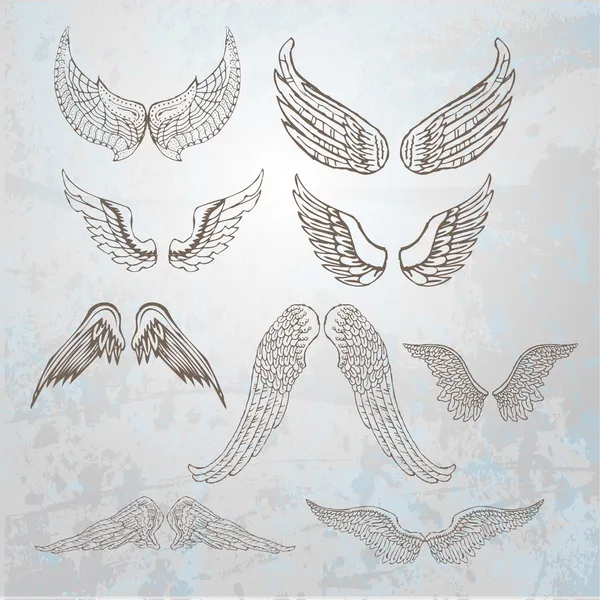 Wings set. hand drawn illustration. — Stock Vector