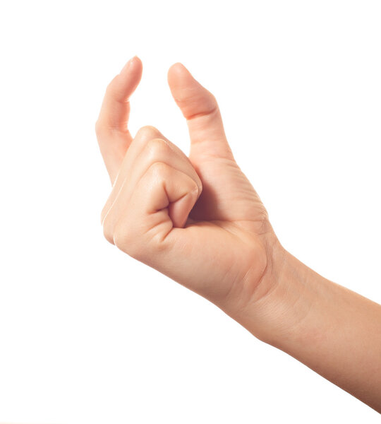 Человеческая рука держит что-то двумя пальцами
