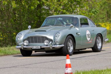 Vintage race touring car Aston Martin DB4 Vantage from 1962 clipart