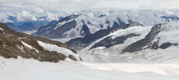 Mountains surrounding Aletsch glacier, Switzerland Stock Photo