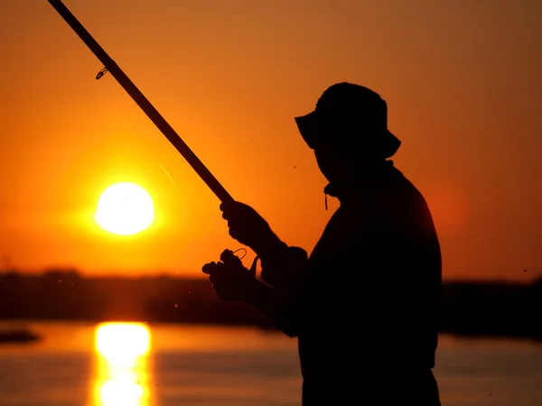 Pêcheur au coucher du soleil — Photo