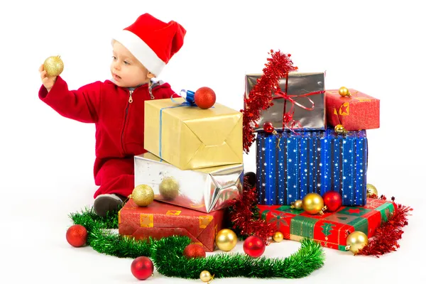 Baby with christmas gifts — Stock Photo, Image