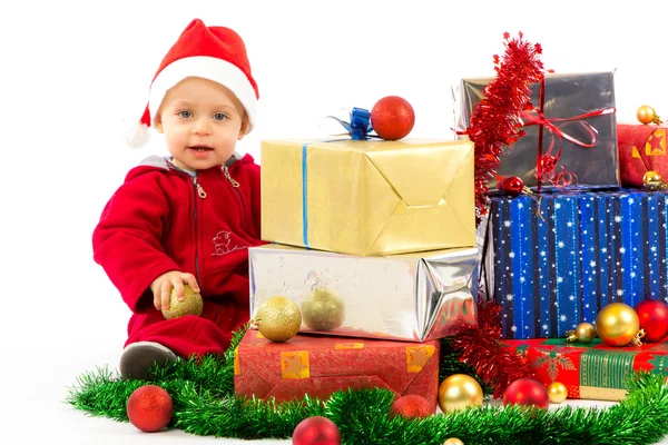 Baby with christmas gifts — Stock Photo, Image