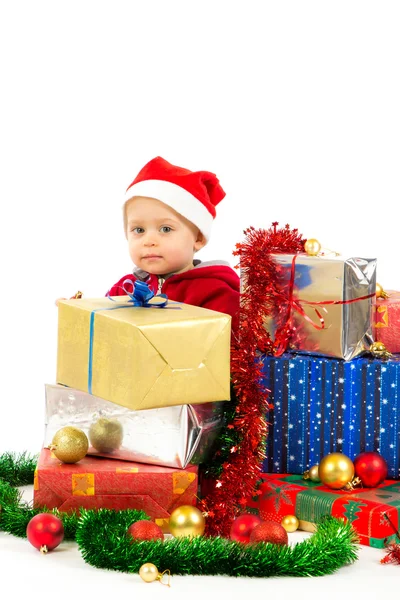 Baby with christmas gifts — Stock Photo, Image