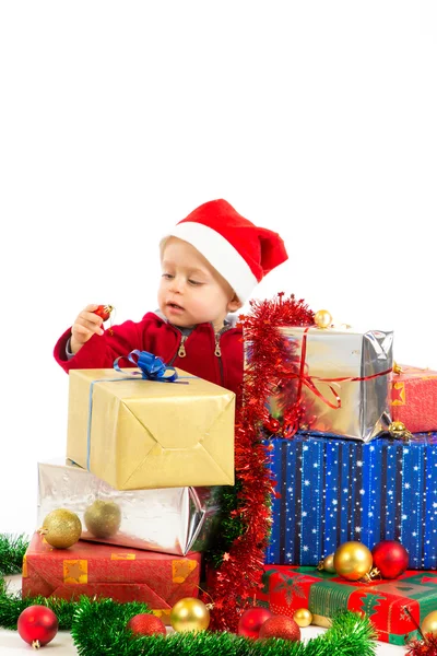 Baby with christmas gifts — Stock Photo, Image