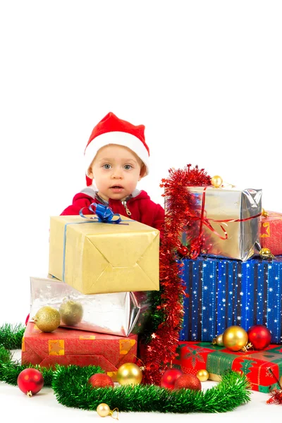 Baby med julklappar — Stockfoto