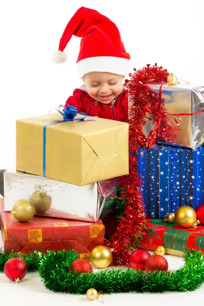 Baby with christmas gifts Royalty Free Stock Photos