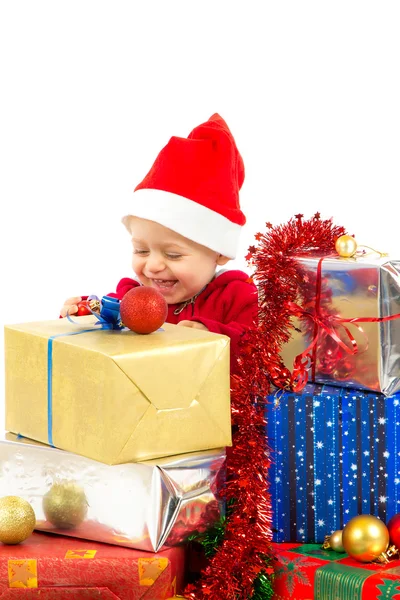 Baby with christmas gifts Royalty Free Stock Images