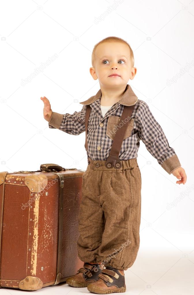 Little boy with suitcase