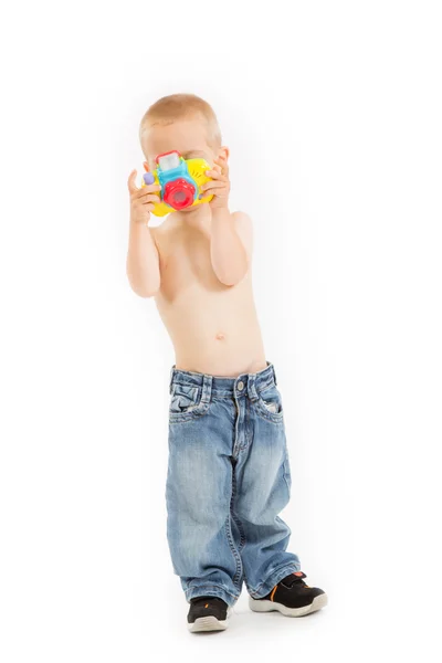 Young half naked boy is taking a photo — Stock Photo, Image